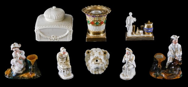 Staffordshire and Continental porcelain inkwells and figures, eight pieces, 19th/ early 20th C., all
