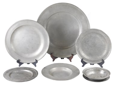 Seven assorted 18th-19th C. continental pewter chargers and dinnerware, includes: large charger with