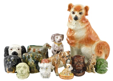Staffordshire, Limoges, etc., thirteen pieces, all dog-form ceramic figures, banks and vase, 19th C.