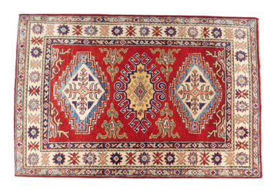 RUG: Uzbek Kazak, 3' 3" x 4' 10", wool on cotton, mustard, salmon and green geometric design on red