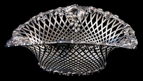 STERLING: Oblong basket with pierced lattice sides, vine design to rim with four areas of fuller