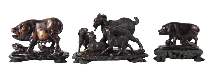 ASIAN: Three carved stone sculptures of mother animals with babies, all deep burgundy carved