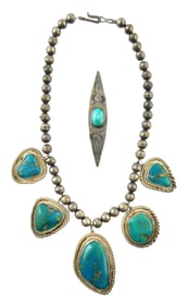 JEWELRY: Southwest style turquoise and silver necklace and pin; pin with etched design around inset