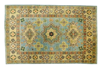 RUG: Uzbek Shirvan, 3' 3" x 5', wool on cotton, three medallions on light blue ground, major border