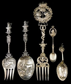 SILVER: Five decorative silver serving spoons and forks, three marked sterling, two with indistinct