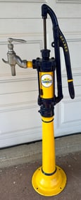 Surface mounted small gas pump, ca 1920’s-30’s, restored, with three period restored gas cans,
