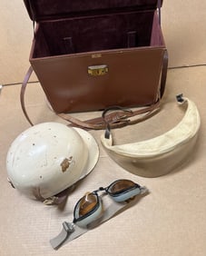 Early 1950’s style race helmet, goggles, visor, leather case, similar to type worn by Stirling
