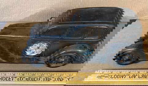 1930’s art deco style car with clock, heavy die cast construction, vg condition