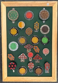 Collection of glass marble eye reflectors, mounted on a large heavy frame, 28 x 40, vg condition