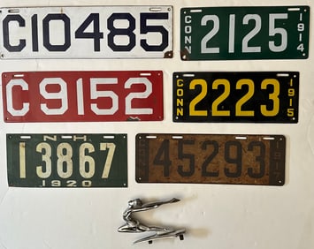 Six license plates, four CT porcelain, 1910, 1911, 1914, 1915, two painted and 1934 Oldsmobile hood