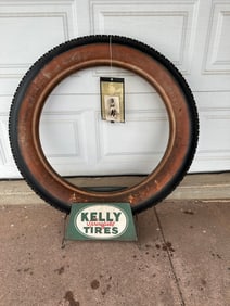 Kelly Springfield tire on display stand with period postcard, ca 1908-1912, tire size 36 x 4.5,