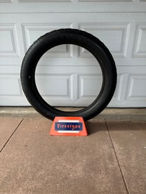 Firestone Non Skid tire on display stand, ca 1908-1912, tire size 36 x 4.5, original old patina