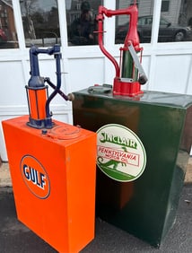 Two restored oil dispensing tanks - Gulf tank 32 high, 51 overall - Sinclair tank 38 high, 51