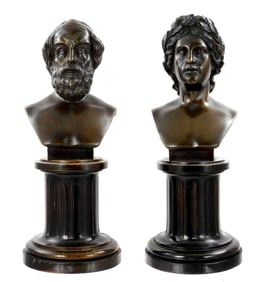 SCULPTURE: Two Grand Tour type bronze busts on fitted wood columnar stands, probably late 19th C.