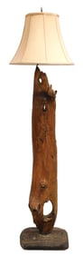 Contemporary driftwood floor lamp, 20th C., signed indistinctly on base, brass hardware including