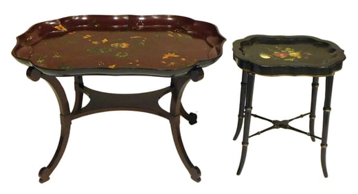 +Two papier-mache trays on stands, English, 19th C., smaller in black with floral and gilt