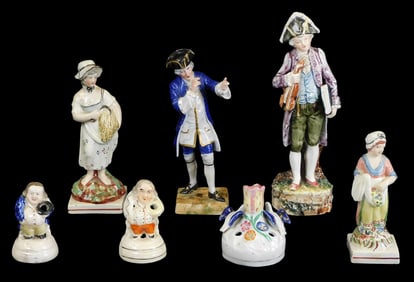 Dresden, Staffordshire, etc., four porcelain figurines and three figural pen holders, seven pieces