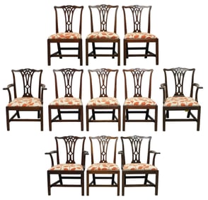 Assembled set of eleven matching mahogany chairs with pierced Gothic splats, flaring slip seats with