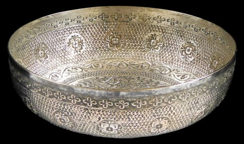 SILVER: Repousse silver bowl, tested, floral and foliate design, 2" h. x 7" dia. [Total Weight: 6.36
