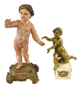 SCULPTURE: Two putti sculptures, details include: Painted figure with glass eyes standing on ornate
