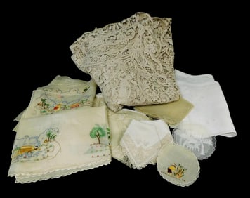 TEXTILES: 25+ pieces, including: Modern lace tablecloth, machine-made, antique style motifs of