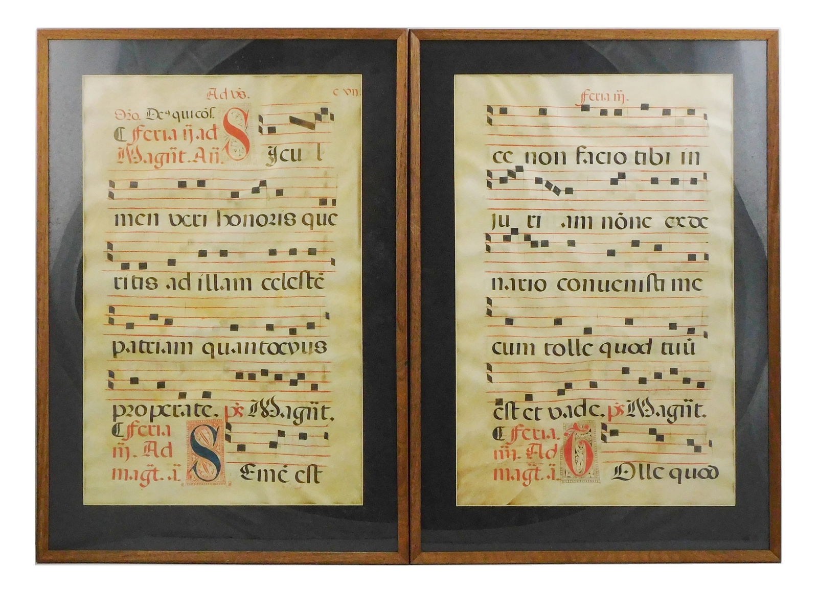Two early framed antiphonal music sheets on vellum, black square musical notation on red staffs, (1 of 2)