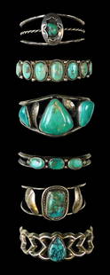 JEWELRY: Six Southwest style silver & turquoise cuff bracelets, two stamped sterling, four tested si: JEWELRY: Six Southwest style silver & turquoise cuff bracelets, two stamped sterling, four tested silver, wear consistent with age and use on all including tarnish, all approximately 2 1/2" diameter,