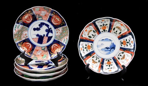 ASIAN: 19th/ 20th C. Imari plates, five pieces, details include: four matching plates with tree /