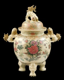 ASIAN: Japanese Satsuma Koro footed urn, early 20th C., foo dog handles and lid topper, cream ground