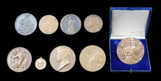 Nine commemorative medals, all bronze and brown-tone cast metal, mid-late 20th C., boxed