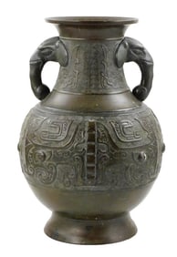 ASIAN: Bronze vase with archaic style relief decoration and flanking elephant handles, Chinese,
