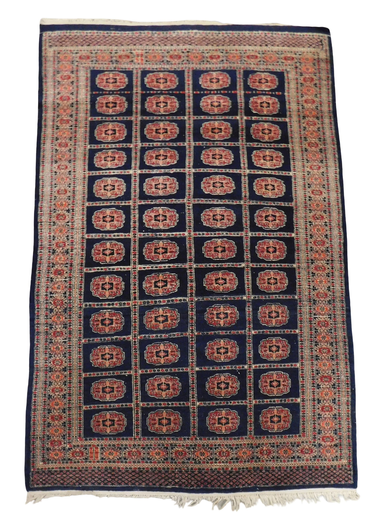 RUG: Modern Tekke Bokhara rug, 6' 2" l. x 3' 10" w., dark blue field, four rows of twelve guls in (1 of 3)