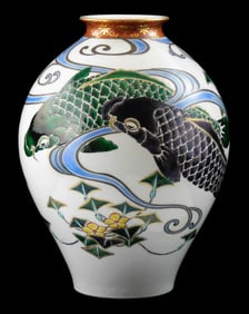 ASIAN: Porcelain vase, Japanese, 20th C., polychrome decorated with purple and green carp swimming a