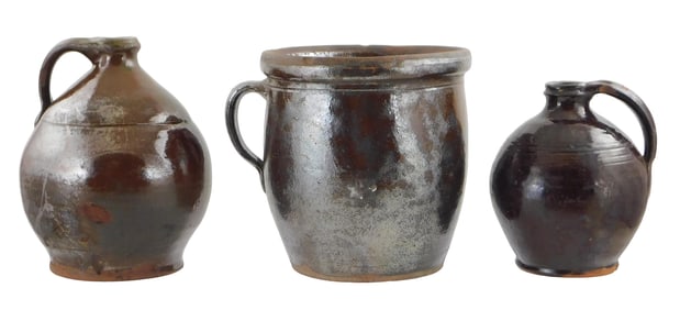 19th C. New England redware jugs and crock, three pieces, details include: one single-handled crock,