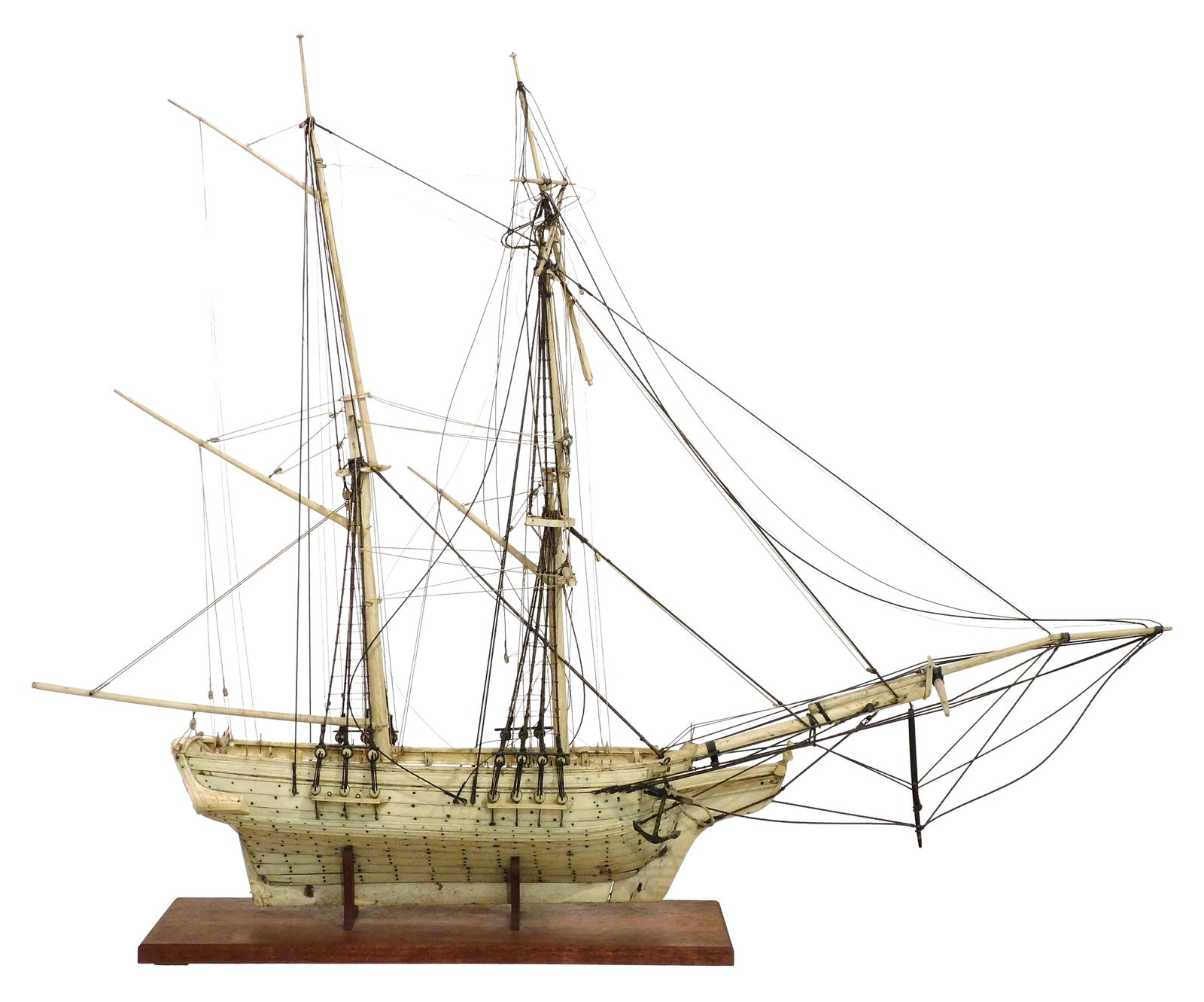 + Napoleonic Prisoner of War carved bone ship/brig, two masts, metal name plate on rear side inscrib: + Napoleonic Prisoner of War carved bone ship/brig, two masts, metal name plate on rear side inscribed "Susannah", likely modelled after a merchant ship or yacht, carved figurehead and stern captain's