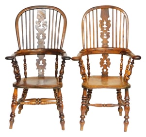 Two English Windsor armchairs, pierced vertical splats, 19th - 20th C., possibly yew wood, turned le