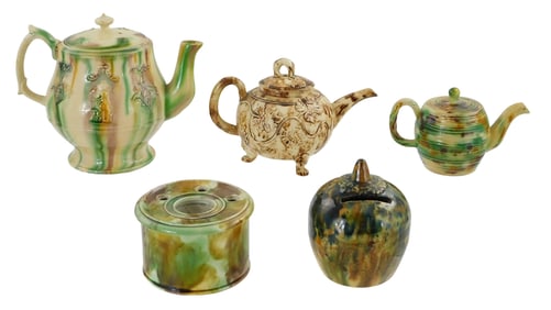 Whieldon-style creamware, five pieces including three teapots, one coin bank, and one inkwell, unmar