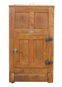 Ice box by Victory, American, c. 1910, golden oak with ?Victory? brass label on front, lift top ice