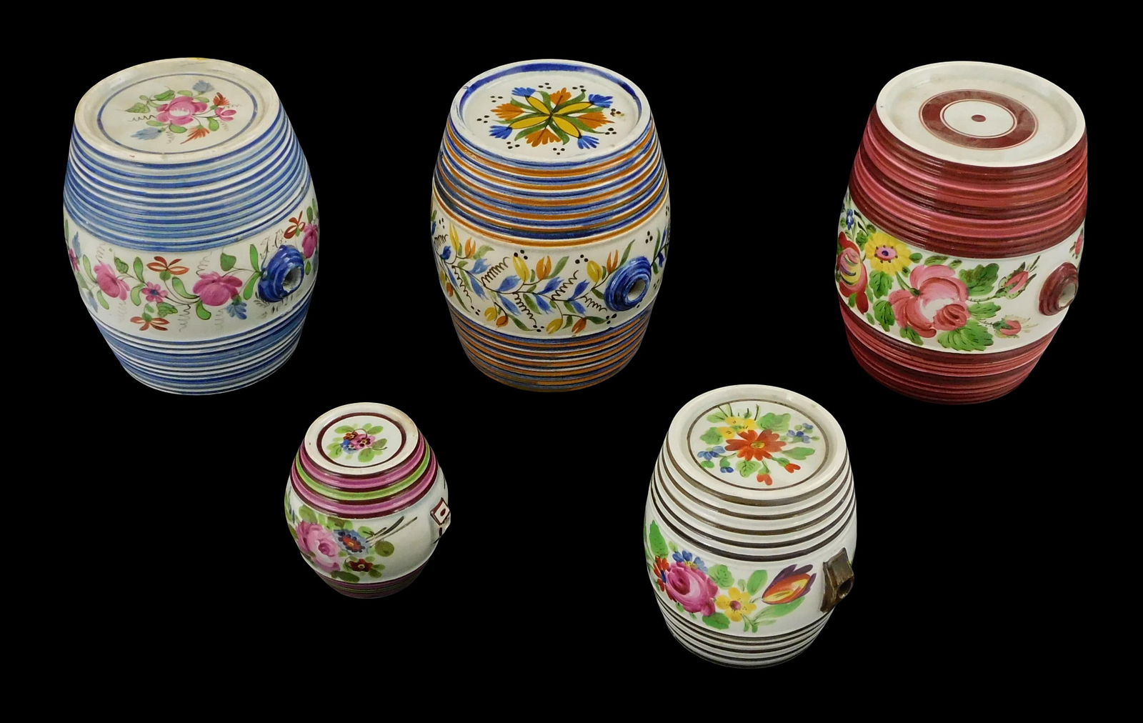 Five Bristol pottery spirit barrels, all with central floral spray bands and incised ribbing around  (1 of 2)