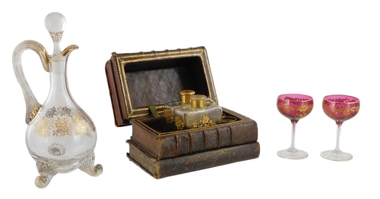 Leather book tantalus decanter set with larger decanter and other glass, early 20th C., details