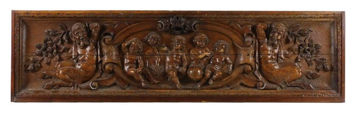 Renaissance Revival carved wood panel, 19th C., figural carving in high relief of satyrs and putti,