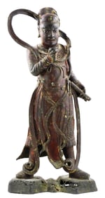 ASIAN: Gilt lacquered bronze figure of a warrior, Chinese, Ming style and possibly of the period,