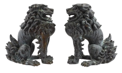 ASIAN: Pair of Chinese Foo Dog guardians, patinated metal, matching seated position with open mouth,