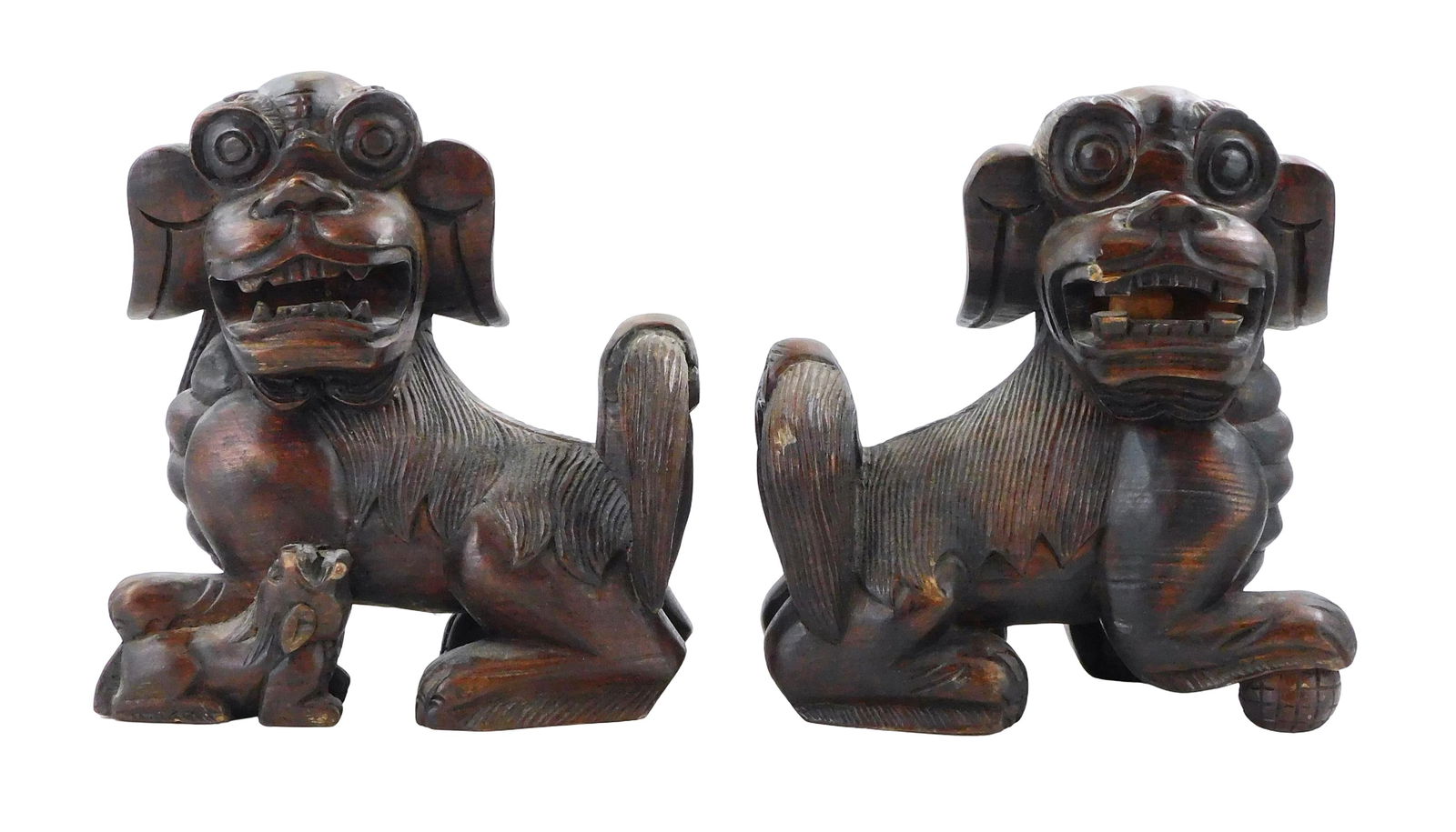 +ASIAN: Pair of carved wood Buddhistic lions (foo dogs), Chinese, early to mid 20th C., male with ca (1 of 4)