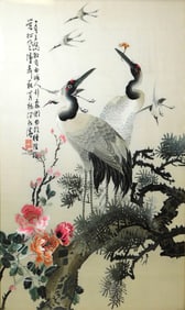 ASIAN: Framed Chinese silk embroidery of cranes, 20th C., depicts two birds in foreground catching