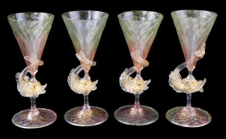 GLASS: Venetian glass stemware, 20th C., possibly Salviati, four pedestal foot goblets with dolphin