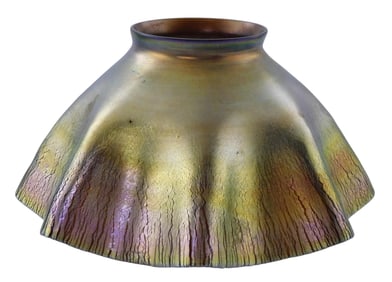 Louis Comfort Tiffany Favrile glass candlestick lampshade, early 20th C., undulating rim design,