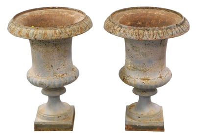 GARDEN: Two classical cast iron garden urns, (appear to be a pair w/ varied patina/ wear), early