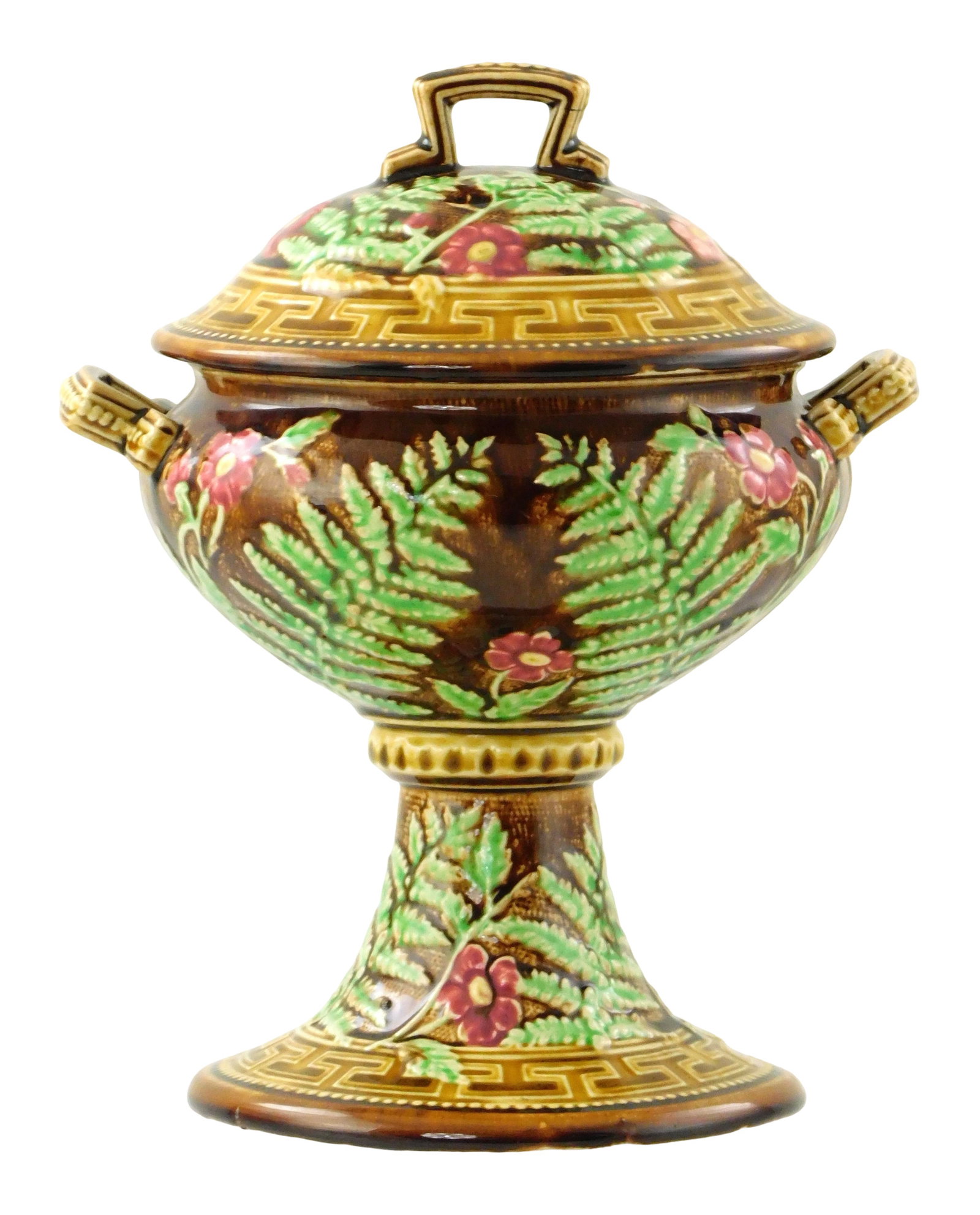 Majolica Compotier by Choisy le Roi, 19th C., footed and lidded compotier featuring ferns and flower: Majolica Compotier by Choisy le Roi, 19th C., footed and lidded compotier featuring ferns and flowers on brown ground with Greek key borders, wear consistent with age and use including hairline to fin