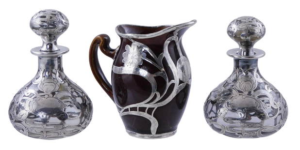 La Pierre and Lenox Art Nouveau silver overlay hollowware, c. 1900, three pieces, including: pair of: La Pierre and Lenox Art Nouveau silver overlay hollowware, c. 1900, three pieces, including: pair of La Pierre (American, 20th C.) silver overlay on clear glass cologne bottles, signed on stopper, som